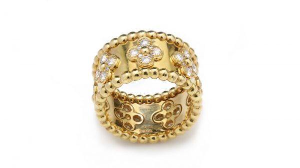 Vintage Van Cleef and Arpels Perlee Clover Floral Diamond Band Ring; 1.40 carats round brilliant-cut diamonds in a floral design, in 18ct yellow gold. Circa 1990s