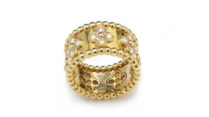 Vintage Van Cleef and Arpels Perlee Clover Floral Diamond Band Ring; 1.40 carats round brilliant-cut diamonds in a floral design, in 18ct yellow gold. Circa 1990s