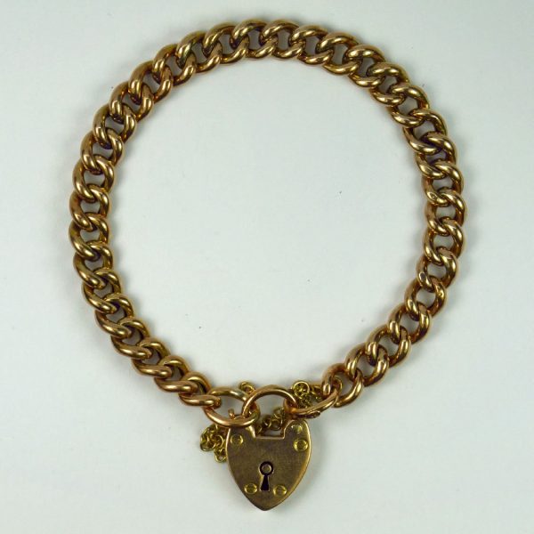 Rose Gold Curb Link Bracelet with Heart Padlock Clasp; traditional 9ct rose gold curb link bracelet secured with a heart padlock clasp, heart marked for P&M Ltd, Birmingham