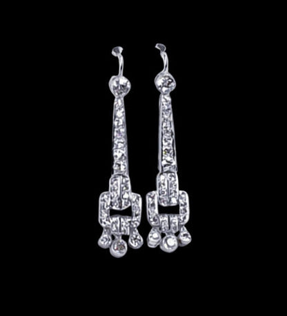 Art Deco Old Cut Diamond Drop Earrings in Platinum; set with 3.72 carats of old-cut diamonds in an articulated geometric design, Circa 1920
