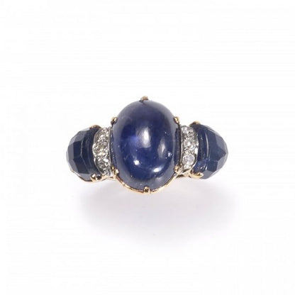 Vintage 1950s Cabochon Sapphire and Diamond Three Stone Ring, 9.00ct cabochon sapphire flanked by fancy faceted sapphires and brilliant diamonds