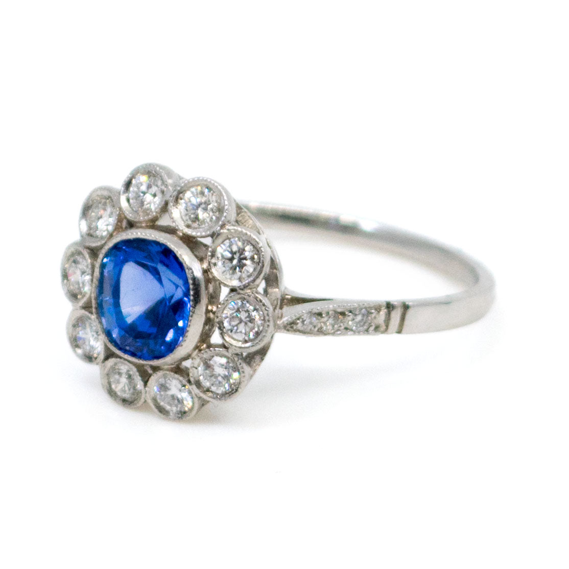 Vintage Sapphire 1.06 Carats, Diamond 0.40 Carat and Platinum Cluster Ring