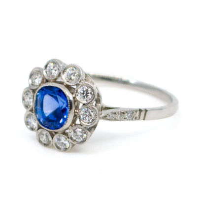 Vintage Sapphire 1.06 Carats, Diamond 0.40 Carat and Platinum Cluster Ring
