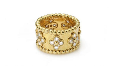 Vintage Van Cleef and Arpels Perlee Clover Floral Diamond Band Ring; 1.40 carats, 18ct yellow gold. Circa 1990s