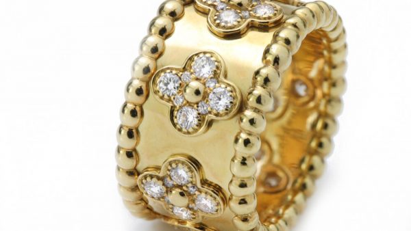 Vintage Van Cleef and Arpels Perlee Clover Floral Diamond Band Ring; 1.40 carats. Circa 1990s