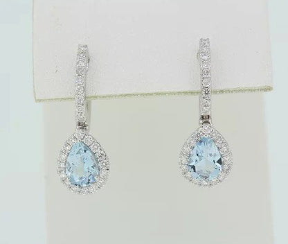 Aquamarine and Diamond Pear Shaped Cluster Drop Earrings; 1.27cts pear aquamarines surrounded by diamonds, diamond set hoop, 18ct white gold.