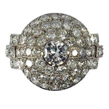 Art Deco French 3.60ct Diamond and Platinum Target Dome Bombe Ring; central 0.50ct round brilliant cut diamond surrounded with 48 brilliant diamonds and diamond set shoulders, 3.60 carat total