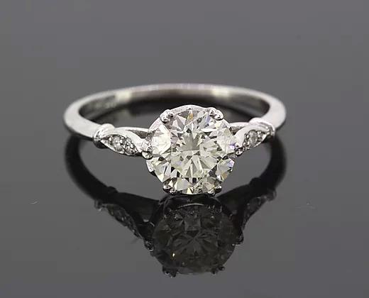 Vintage 1.51ct Old Cut Diamond Solitaire Engagement Ring; featuring a 1.51 carat old-cut diamond, six double-claw set in platinum, diamond set shoulders.