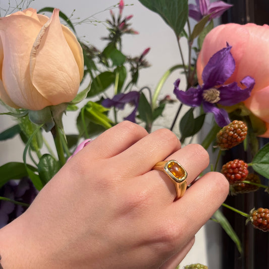 A yellow gold citrine ring, modelled on a hand