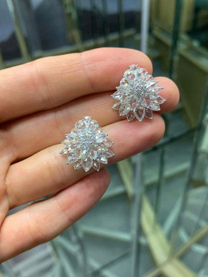 8.21ct Rose Cut Diamond Floral Cluster Stud Earrings; set with pear shaped rose-cut diamonds and round brilliant cut diamonds, 18ct white gold