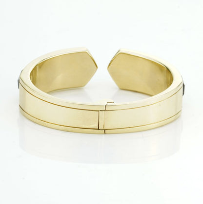 Stephen Webster Bangle Bracelet from Crystal Haze Collection; two faceted quartz crystal sections overlay a layer of Mother of Pearl, surrounded by 0.90cts brilliant cut diamonds, in 18ct yellow gold