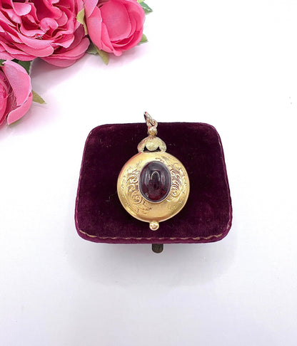 Victorian 15 Carat Two-Colour Gold Cabochon Garnet Locket Back Pendant, Circa 1870