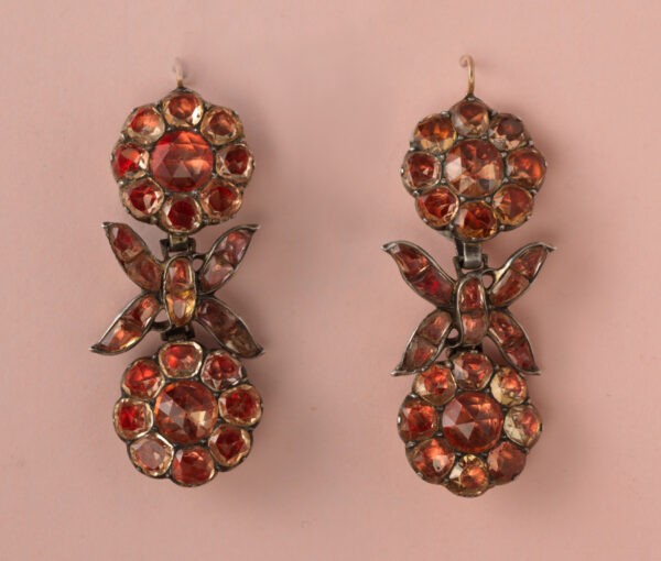 18th Century Imperial Topaz Cluster Drop Earrings, set in silver and backed with foil, decorated with flowers and bows, gold hooks. Portugal, circa 1750.