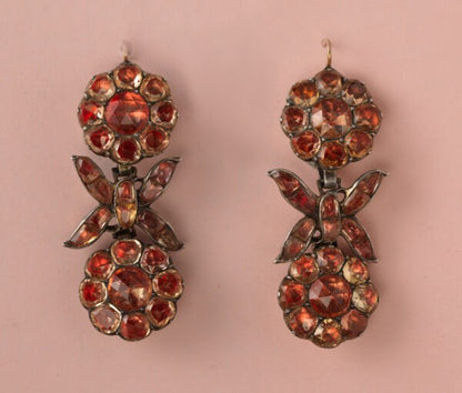 18th Century Imperial Topaz Cluster Drop Earrings, set in silver and backed with foil, decorated with flowers and bows, gold hooks. Portugal, circa 1750.