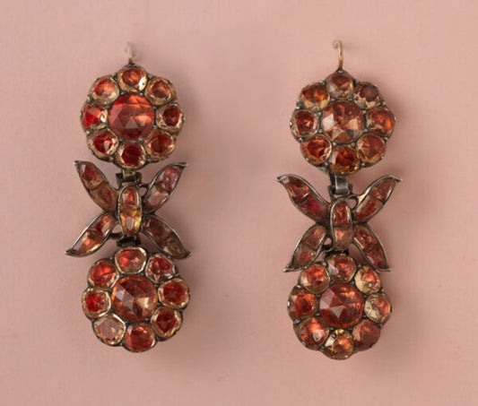 18th Century Imperial Topaz Cluster Drop Earrings, set in silver and backed with foil, decorated with flowers and bows, gold hooks. Portugal, circa 1750.