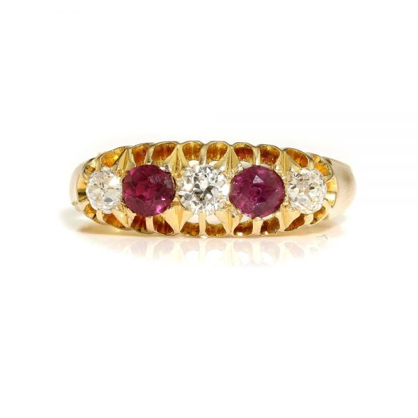 Antique Burma Ruby and Old Cut Diamond Five Stone Ring; set with two round faceted Burmese rubies and three old-cut diamonds in 18ct yellow gold, Made in Sheffield, Circa 1862
