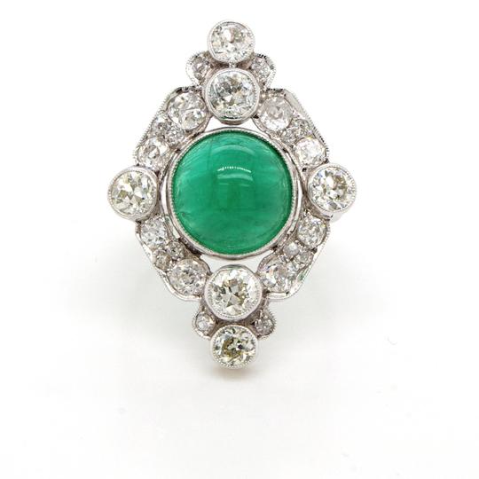 Art Deco 4ct Cabochon Emerald, Diamond and Platinum Cluster Plaque Ring; navette-style ring featuring a 4ct cabochon emerald within diamond-shaped surround of 2.40cts old cut diamonds