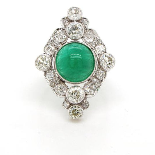 Art Deco 4ct Cabochon Emerald, Diamond and Platinum Cluster Plaque Ring; navette-style ring featuring a 4ct cabochon emerald within diamond-shaped surround of 2.40cts old cut diamonds