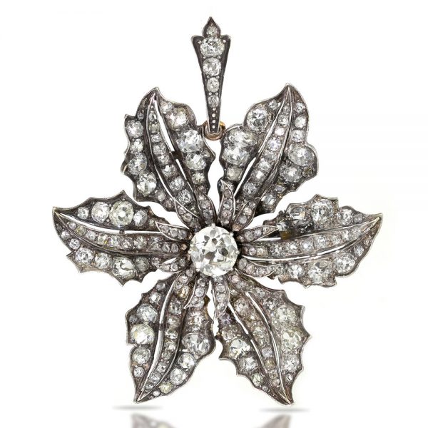 Antique Victorian Old Cut Diamond Flower Pendant, 9 carat total, central 2ct old European cut diamond surrounded by further old cut diamonds, in silver and 15ct gold. Made in England, Circa 1840s