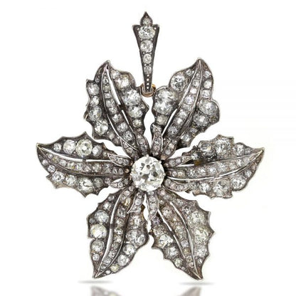 Antique Victorian Old Cut Diamond Flower Pendant, 9 carat total, central 2ct old European cut diamond surrounded by further old cut diamonds, in silver and 15ct gold. Made in England, Circa 1840s