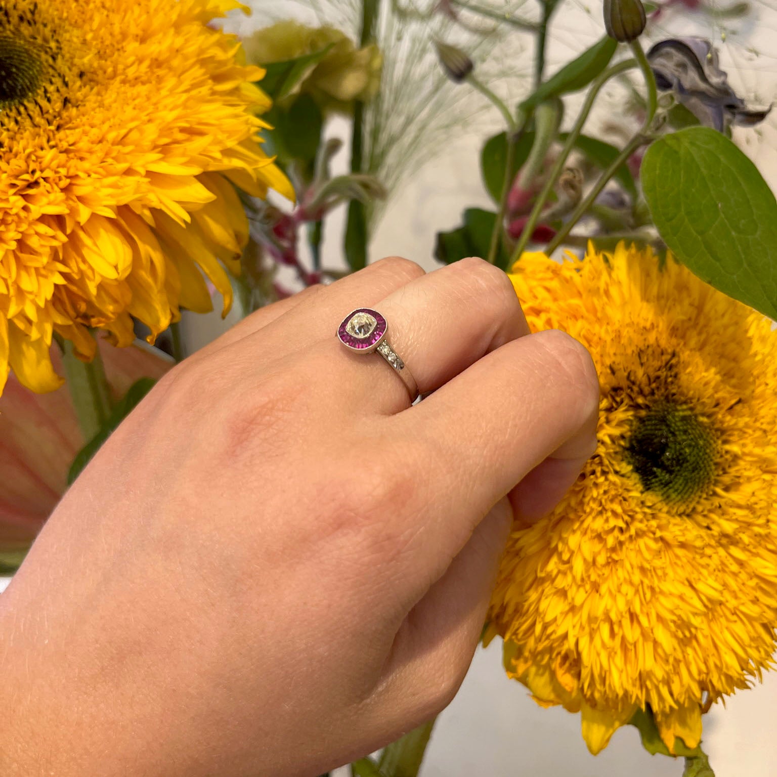 Platinum, Cushion-Cut Diamond and Ruby Halo Cluster Ring, 0.65 Carat