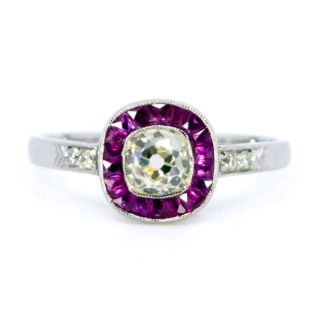 Platinum, Cushion-Cut Diamond and Ruby Halo Cluster Ring, 0.65 Carat