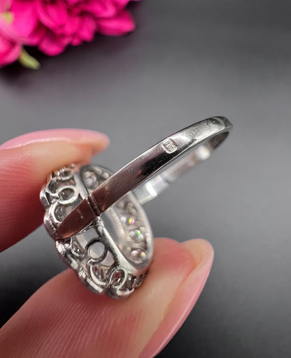Antique French Platinum Cabochon Moonstone and Diamond Cluster Ring, Circa 1920