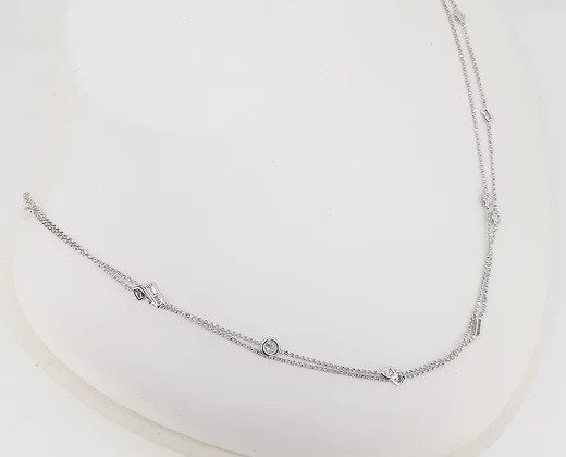 Mixed Cut Diamond Set Chain Necklace; A 36 inch 18ct white gold chain necklace, bezel set with mixed cut diamonds, 1.32 carat total
