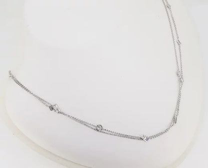 Mixed Cut Diamond Set Chain Necklace; A 36 inch 18ct white gold chain necklace, bezel set with mixed cut diamonds, 1.32 carat total
