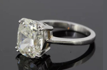 Cushion Cut 5.11 carat Diamond Solitaire Engagement Ring, four double-claw set, mounted in 18ct white gold.