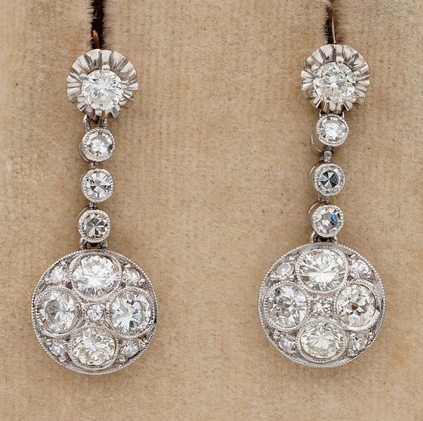 Antique Art Deco 2.40ct Old European Cut Diamond Drop Earrings, set with 1.60cts old European-cut diamonds and 0.80cts old Swiss cut diamonds in platinum upon 18ct yellow gold