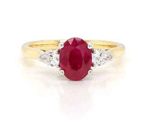 Oval Cut 0.88ct Ruby and Diamond Three Stone Ring, 18ct yellow gold