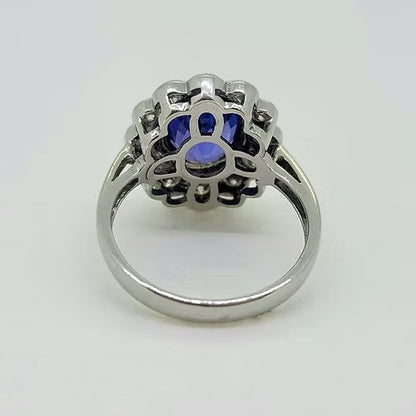 3ct Oval Tanzanite and Diamond Floral Cluster Engagement Ring