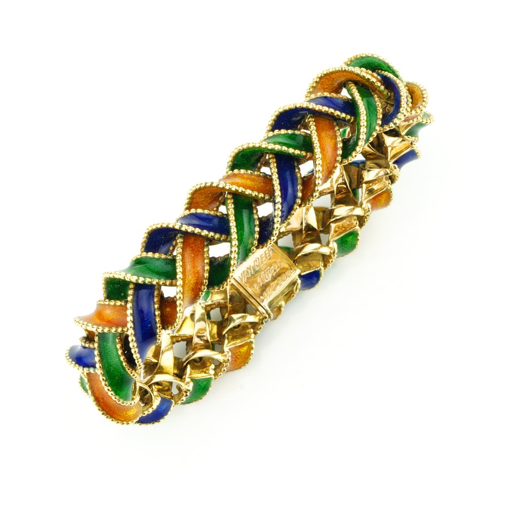 Vintage Van Cleef and Arpels 18ct Gold and Enamel Plait Bracelet; a plaited 18ct yellow gold bracelet decorated with orange, green and blue enamel, Signed and Numbered, in original box, Circa 1960s