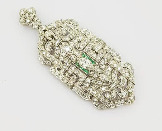 Antique Diamond and Emerald set Brooch Pendant; set with marquise and brilliant cut diamonds, central emerald border, geometric design, 18ct white gold