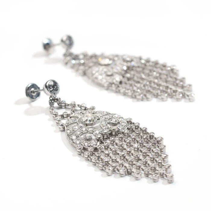 Vintage Late Art Deco 6.93ct Diamond and Platinum Chandelier Fringe Drop Earrings, with 6.93 carats of brilliant-cut, Edwardian-cut and old-cut diamonds, Circa 1935