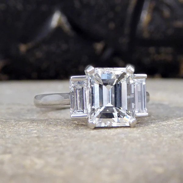 2.57ct Emerald and Baguette Cut Diamond Three Stone Engagement Ring in Platinum