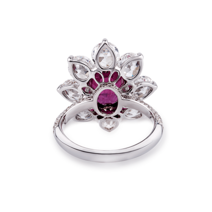 Burmese Ruby and Old Cut Diamond Floral Cluster Ring; central 3.69 carat Burmese ruby framed by 8 round old-cut diamonds, accented by 94 pave set diamonds. Total diamond weight 4.46cts