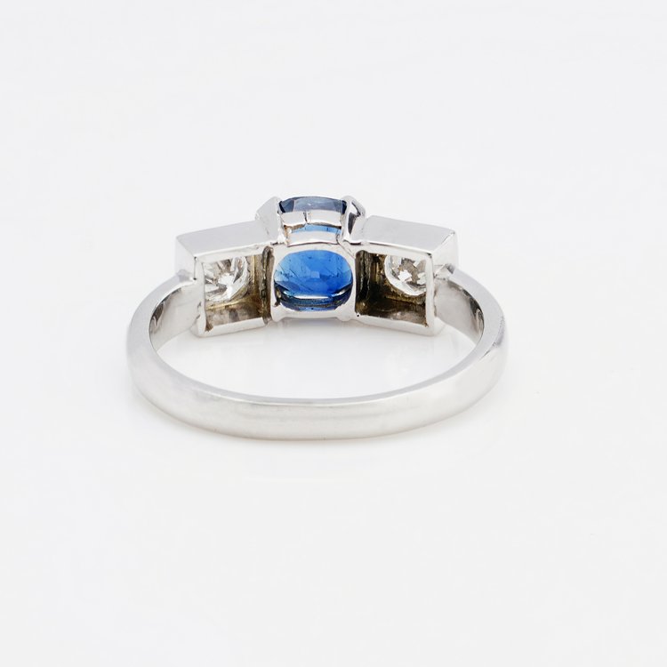 Cushion Cut Sapphire and Diamond Three Stone Ring in Platinum