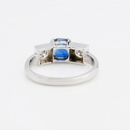 Cushion Cut Sapphire and Diamond Three Stone Ring in Platinum