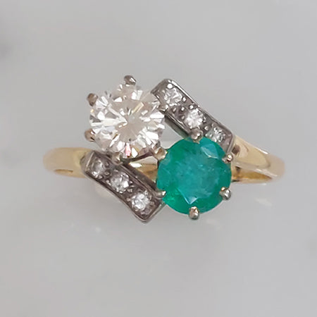 Vintage Emerald and Diamond Toi et Moi Two Stone Crossover Engagement Ring