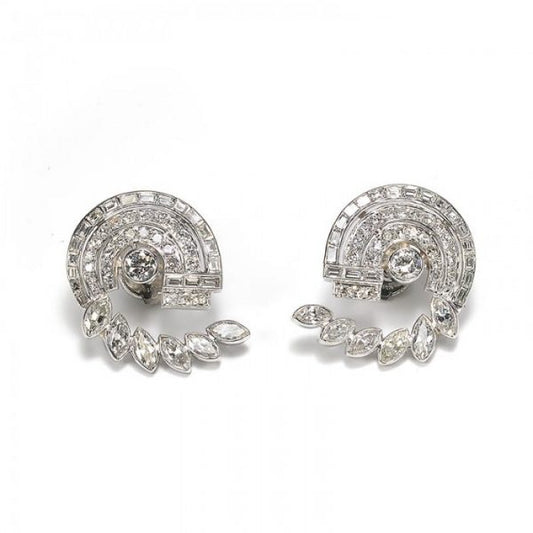 Vintage Diamond Earrings in Platinum; pair diamond scroll earrings, comprising a central round brilliant-cut diamond, surrounded by brilliant and single-cut diamonds, with an outer scroll of baguette and marquise-cut diamonds, 6.75 carat total, Circa 1950s