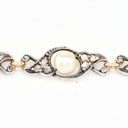 Edwardian Antique Natural Pearl and Rose Cut Diamond Bracelet, openwork scroll links set with rose-cut diamonds around natural pearls in silver upon 18ct yellow gold. Circa 1905