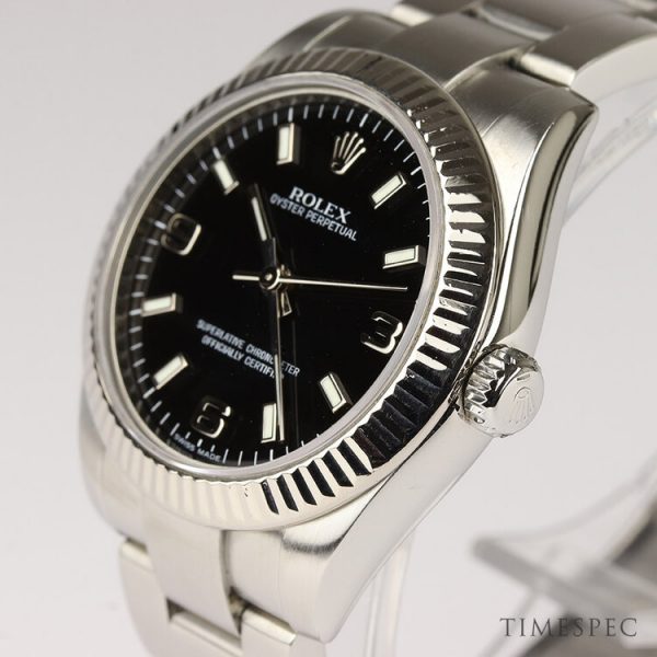 Rolex Oyster Perpetual Midsize 31mm Steel and White Gold Automatic Watch; Ref 177234, black dial, screw down crown and sapphire crystal, on a stainless steel Oyster bracelet, Circa 2006-2007