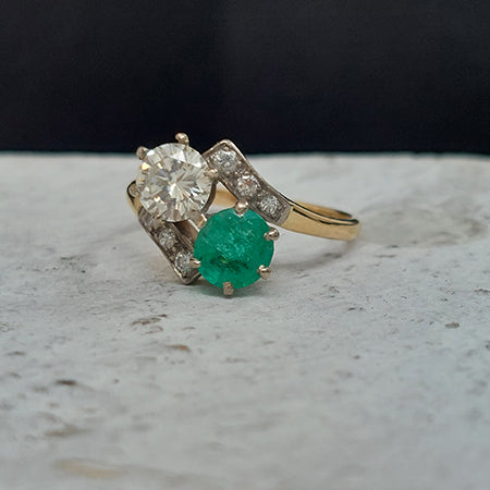 Vintage 0.65ct Diamond and Emerald Toi et Moi Two Stone Crossover Engagement Ring