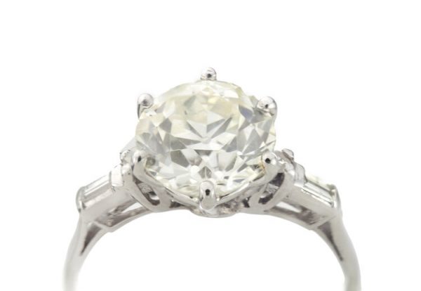 Art Deco Diamond and Platinum Engagement Ring; 3.02ct old European cut diamond with baguette-cut diamond-set shoulders, with GCS certificate