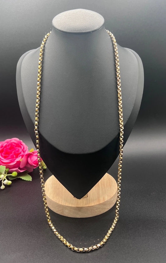 A yellow gold belcher link chain necklace, on a black jewellery bust
