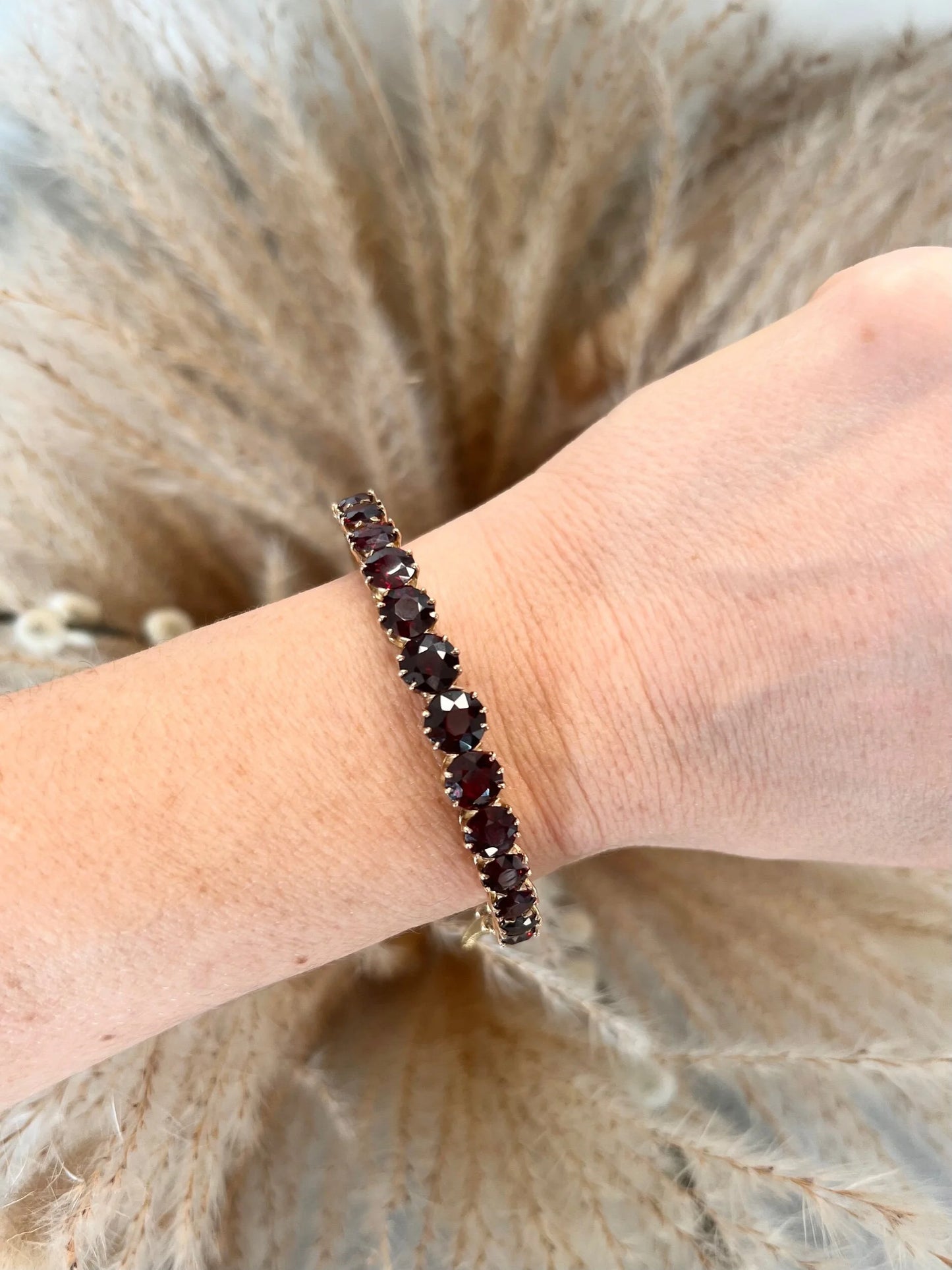 Antique Edwardian 14 Carat Gold Faceted Garnet Bangle Bracelet, Circa 1900