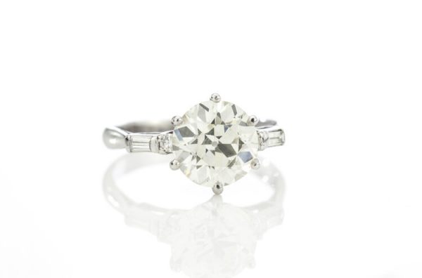 Art Deco Diamond and Platinum Engagement Ring; 3.02ct old European cut diamond with baguette-cut diamond-set shoulders, with GCS certificate