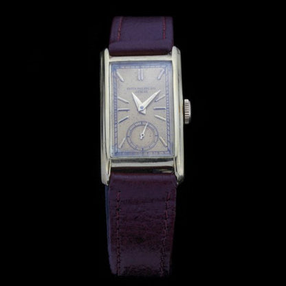 Vintage Patek Philippe 18ct Yellow Gold Manual Watch; Ref 611725 with manual winding movement no 830367, on a leather strap, Circa 1940s